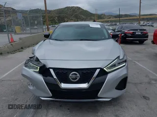 2020 Nissan Maxima SV with VIN 1N4AA6CVXLC380646, listed as a IAAI auction lot 42041422 with 99,579 mi miles and . Bid and sale history available at DreamBid. Image 12.