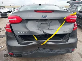 2017 Ford Focus SE z VIN 1FADP3F23HL325751, wystawiony jako IAAI lot #42182722 z przebiegiem 46 119 mil mil oraz . Historia ofert i sprzedaży dostępna na DreamBid. Obrazek 16.