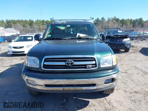 2000 Toyota Tundra Limited with VIN 5TBBT4815YS065867, listed as a IAAI auction lot 41995501 with 208,889 mi miles. Bid and sale history available at carsss.com. Image 12.