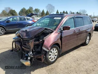 2010 Honda Odyssey EX-L with VIN 5FNRL3H60AB041353, listed as a Copart auction lot 52801315 with 120,253 mi miles and Salvage Title. Bid and sale history available at DreamBid. Image 1.