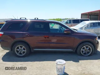 2012 Dodge Durango Crew with VIN 1C4RDJDG0CC337408, listed as a IAAI auction lot 42193647 with 186,352 mi miles and . Bid and sale history available at carsss.com. Image 14.