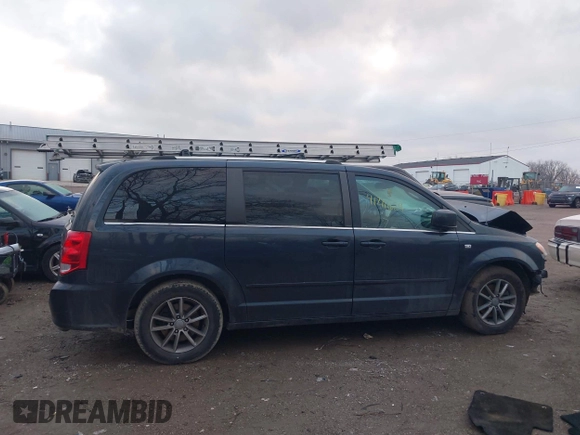 2014 Dodge Grand Caravan SXT with VIN 2C4RDGCG8ER257837, listed as a IAAI auction lot 41211629 with 139,231 mi miles and . Bid and sale history available at DreamBid. Image 14.