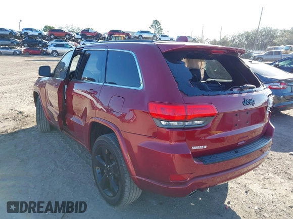 2014 Jeep Grand Cherokee Laredo with VIN 1C4RJEAG3EC519708, listed as a IAAI auction lot 41616364 with 131,184 mi miles. Bid and sale history available at carsss.com. Image 3.