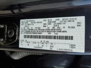 2022 Ford F-150 Lightning Pro z VIN 1FT6W1EV7NWG10601, wystawiony jako Copart lot #55057445 z przebiegiem Nie podano mil oraz Szkoda całkowita • Salvage title. Historia ofert i sprzedaży dostępna na DreamBid. Obrazek 12.