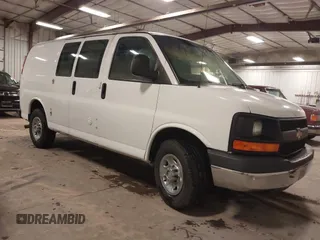 2014 Chevrolet Express Cargo Van with VIN 1GCWGFCGXE1145405, listed as a IAAI auction lot 41331839 with 204,793 mi miles. Bid and sale history available at carsss.com. Image 1.