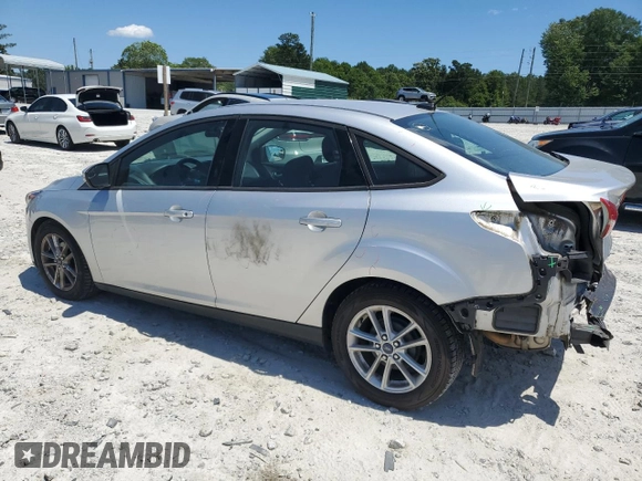 2017 Ford Focus SE with VIN 1FADP3F27HL223918, listed as a Copart auction lot 57464685 with 134,253 mi miles and Salvage title. Bid and sale history available at DreamBid. Image 2.