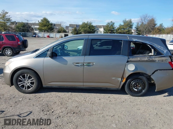 2012 Honda Odyssey EX-L with VIN 5FNRL5H63CB016526, listed as a IAAI auction lot 41701396 with 132,016 mi miles and . Bid and sale history available at carsss.com. Image 15.