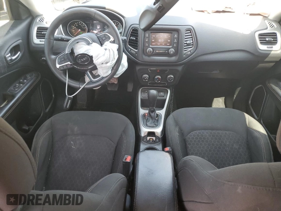 2018 Jeep Compass Sport with VIN 3C4NJCABXJT105430, listed as a Copart auction lot 59237575 with 104,600 mi miles and Salvage title. Bid and sale history available at DreamBid. Image 8.