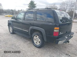 2004 Chevrolet Tahoe LT with VIN 1GNEC13Z74J314927, listed as a IAAI auction lot 41231288 with 195,809 mi miles and . Bid and sale history available at DreamBid. Image 3.
