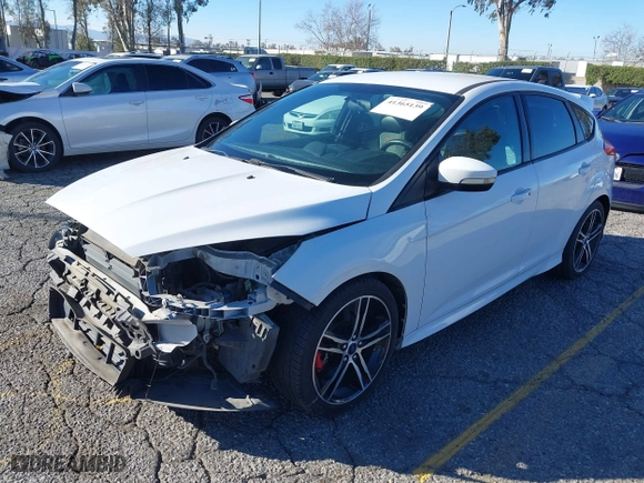 2015 Ford Focus ST with VIN 1FADP3L92FL380352, listed as a IAAI auction lot 41365139 with 136,226 mi miles. Bid and sale history available at carsss.com. Image 2.