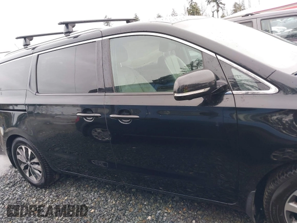 2016 Kia Sedona EX with VIN KNDMC5C11G6160910, listed as a IAAI auction lot 40905404 with 105,523 mi miles. Bid and sale history available at carsss.com. Image 13.