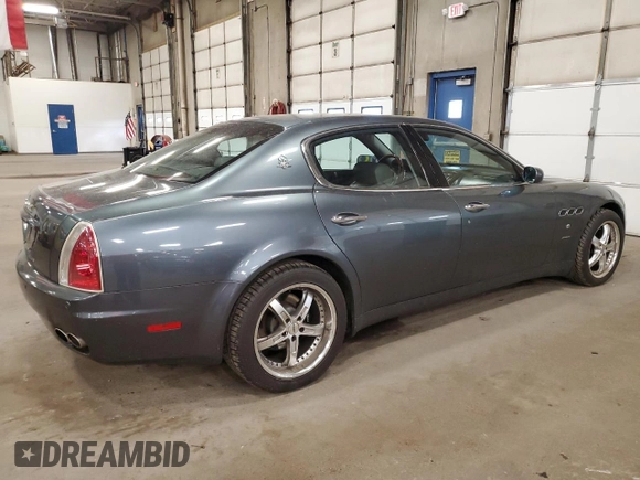 2005 Maserati Quattroporte z VIN ZAMCE39A350017390, wystawiony jako Copart lot #72455664 z przebiegiem 50 394 mil mil oraz Szkoda całkowita • Salvage title. Historia ofert i sprzedaży dostępna na DreamBid. Obrazek 3.
