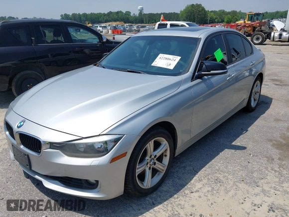 2013 BMW 3 Series 328i xDrive with VIN WBA3B3C52DJ975970, listed as a IAAI auction lot 42280624 with 2,262,225 mi miles and . Bid and sale history available at DreamBid. Image 2.