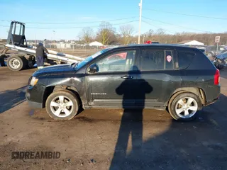 2012 Jeep Compass Latitude with VIN 1C4NJDEB5CD697957, listed as a IAAI auction lot 41807133 with 105,873 mi miles. Bid and sale history available at carsss.com. Image 14.
