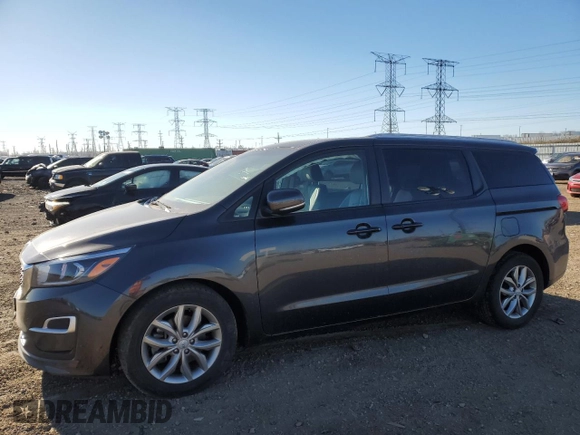 2021 Kia Sedona LX with VIN KNDMB5C1XM6671806, listed as a Copart auction lot 83027514 with 58,884 mi miles and Salvage Title. Bid and sale history available at carsss.com. Image 1.