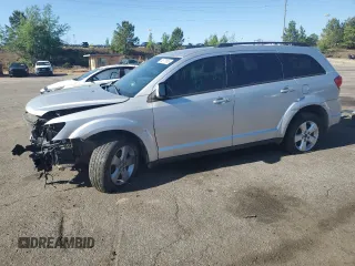 2011 Dodge Journey Mainstreet with VIN 3D4PG1FG7BT549031, listed as a Copart auction lot 54573865 with 232,338 mi miles and Salvage title. Bid and sale history available at DreamBid. Image 1.
