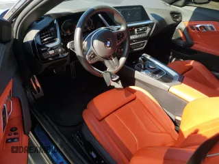2024 BMW Z4 sDrive30i with VIN WBAHF3C06RWY36286, listed as a Copart auction lot 50296565 with 9,898 mi miles and Salvage title. Bid and sale history available at DreamBid. Image 8.