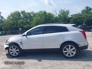 2010 Cadillac SRX Premium Collection with VIN 3GYFNFEY1AS575046, listed as a IAAI auction lot 42576770 with 135,129 mi miles and . Bid and sale history available at DreamBid. Image 14.