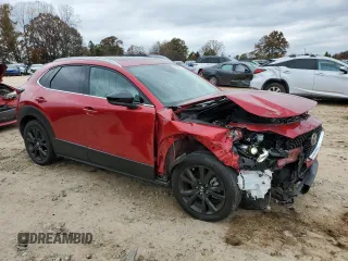 2023 Mazda CX-30 Premium Plus with VIN 3MVDMBEY4PM502466, listed as a Copart auction lot 81229714 with 12,301 mi miles and Salvage title. Bid and sale history available at DreamBid. Image 4.