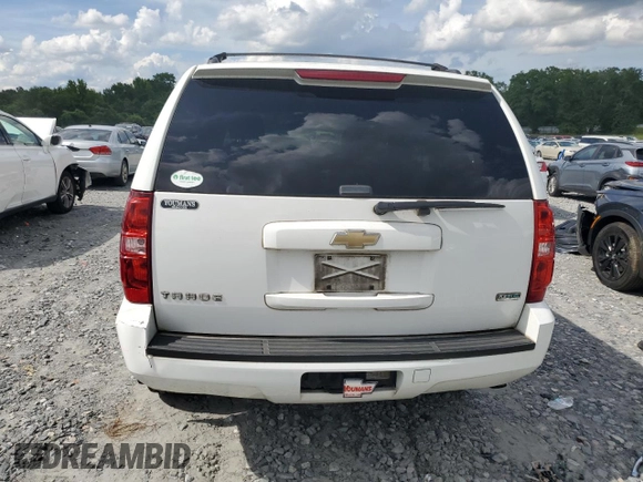 2011 Chevrolet Tahoe LS with VIN 1GNSCAE08BR394917, listed as a Copart auction lot 60470395 with 143,824 mi miles and Salvage title. Bid and sale history available at DreamBid. Image 6.