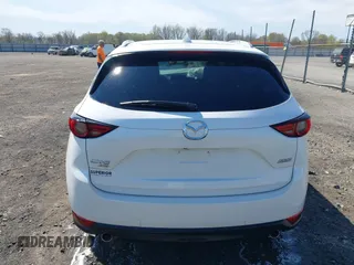 2018 Mazda CX-5 Grand Touring with VIN JM3KFBDM0J0404635, listed as a IAAI auction lot 41883068 with 71,178 mi miles. Bid and sale history available at carsss.com. Image 16.