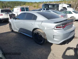 2021 Dodge Charger Scat Pack with VIN 2C3CDXGJ5MH539860, listed as a IAAI auction lot 41683146 with 21,361 mi miles and . Bid and sale history available at DreamBid. Image 3.