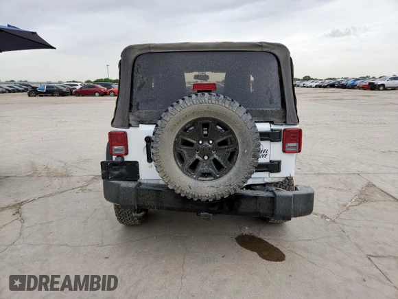 2016 Jeep Wrangler Black Bear with VIN 1C4AJWAG0GL104173, listed as a Copart auction lot 63565415 with 52,922 mi miles and Salvage title. Bid and sale history available at DreamBid. Image 6.