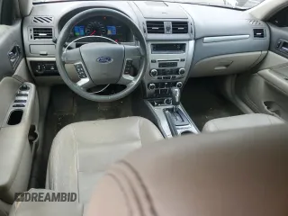 2012 Ford Fusion Hybrid с VIN 3FADP0L35CR184476, выставлен на аукционе Copart как лот 63907885 с пробегом 230 589 миль миль и Списание • Salvage title. История ставок и продаж доступна на DreamBid. Изображение 8.