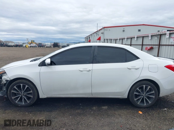 2019 Toyota Corolla L with VIN 5YFBURHE1KP937059, listed as a IAAI auction lot 41901278 with 98,796 mi miles and . Bid and sale history available at DreamBid. Image 15.