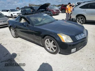 2005 Cadillac XLR z VIN 1G6YV34A955600330, wystawiony jako Copart lot #76173224 z przebiegiem Nie podano mil oraz Szkody całkowita. Historia ofert i sprzedaży dostępna na DreamBid. Obrazek 4.