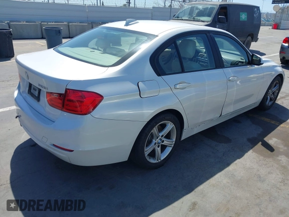 2013 BMW 3 Series 328i with VIN WBA3A5C51DF352812, listed as a IAAI auction lot 41974158 with 176,951 mi miles. Bid and sale history available at carsss.com. Image 4.