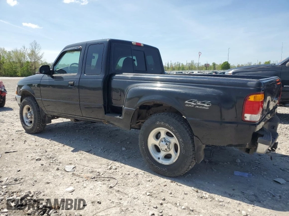 1999 Ford Ranger XLT with VIN 1FTZR15X8XTB13048, listed as a Copart auction lot 53948805 with 154,436 mi miles and Salvage title. Bid and sale history available at DreamBid. Image 2.