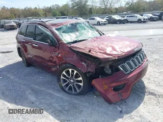 2017 Jeep Grand Cherokee Overland with VIN 1C4RJFCT8HC686540, listed as a IAAI auction lot 41908593 with 119,918 mi miles. Bid and sale history available at carsss.com. Image 1.