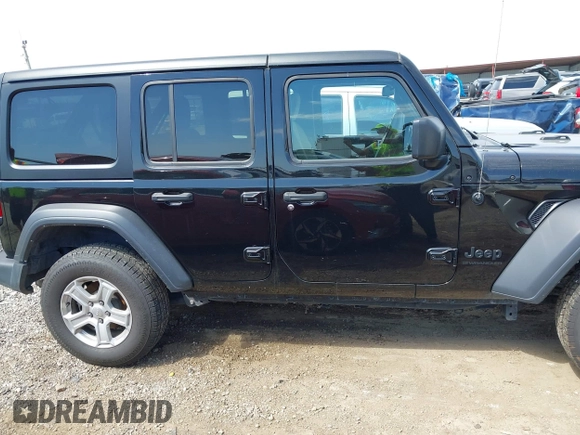 2023 Jeep Wrangler Sport S with VIN 1C4HJXDN6PW599895, listed as a IAAI auction lot 42242107 with 53,980 mi miles and . Bid and sale history available at DreamBid. Image 13.