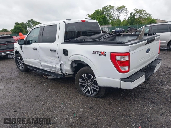 2023 Ford F-150 XL with VIN 1FTEW1EP5PFB87582, listed as a IAAI auction lot 42254015 with 10,476 mi miles and . Bid and sale history available at DreamBid. Image 3.