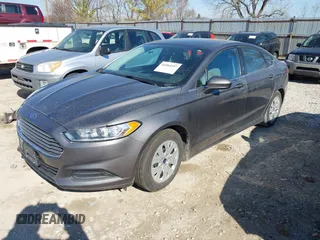 2014 Ford Fusion S with VIN 1FA6P0G79E5360991, listed as a IAAI auction lot 41884597 with 244,786 mi miles and . Bid and sale history available at DreamBid. Image 2.