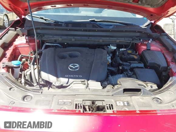 2021 Mazda CX-5 Grand Touring with VIN JM3KFADM5M0470483, listed as a IAAI auction lot 42785031 with 30,749 mi miles and . Bid and sale history available at DreamBid. Image 10.