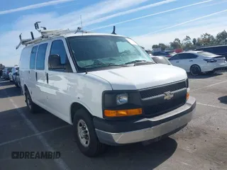 2014 Chevrolet Express Cargo Van with VIN 1GCWGFCB2E1122236, listed as a IAAI auction lot 41381131 with 70,696 mi miles. Bid and sale history available at carsss.com. Image 1.