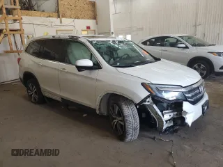2017 Honda Pilot EX-L with VIN 5FNYF6H5XHB067562, listed as a Copart auction lot 50752245 with 110,610 mi miles and Salvage Title. Bid and sale history available at DreamBid. Image 4.