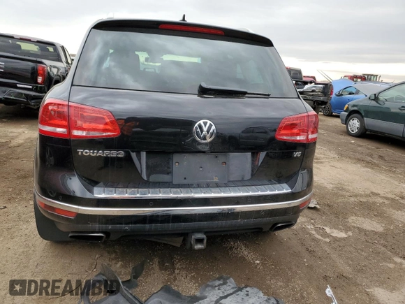 2016 Volkswagen Touareg Sport with VIN WVGEF9BP4GD011455, listed as a Copart auction lot 49734885 with 145,450 mi miles and Salvage Title. Bid and sale history available at DreamBid. Image 6.