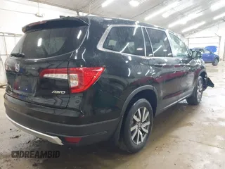 2020 Honda Pilot EX-L z VIN 5FNYF6H58LB061994, wystawiony jako IAAI lot #42358236 z przebiegiem 49 436 mil mil oraz . Historia ofert i sprzedaży dostępna na DreamBid. Obrazek 4.