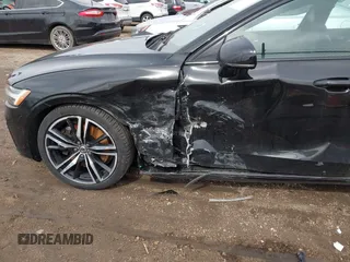 2019 Volvo S60 R-Design with VIN 7JRA22TM9KG014922, listed as a IAAI auction lot 41826883 with 97,702 mi miles. Bid and sale history available at carsss.com. Image 6.