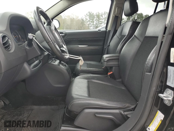 2016 Jeep Compass Latitude with VIN 1C4NJDEB4GD808780, listed as a Copart auction lot 49967215 with 81,683 mi miles and Salvage Title. Bid and sale history available at DreamBid. Image 7.