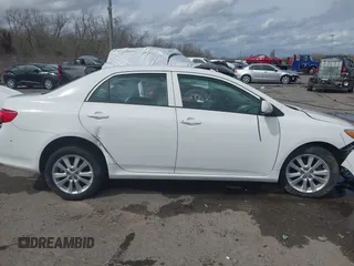 2009 Toyota Corolla with VIN 1NXBU40E59Z023792, listed as a IAAI auction lot 41743473 with 128,454 mi miles. Bid and sale history available at carsss.com. Image 13.