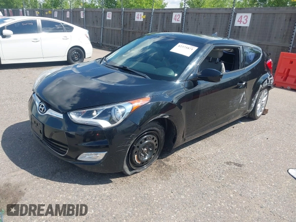 2013 Hyundai Veloster w/Gray Int with VIN KMHTC6AD1DU154946, listed as a IAAI auction lot 42375871 with 108,095 mi miles and . Bid and sale history available at DreamBid. Image 2.