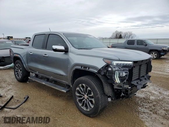 2023 GMC Canyon 4WD Denali with VIN 1GTP6FEK2P1176773, listed as a Copart auction lot 46045715 with 9,711 mi miles and Salvage Title. Bid and sale history available at carsss.com. Image 4.