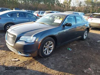2016 Chrysler 300 Limited with VIN 2C3CCAAG5GH151450, listed as a IAAI auction lot 41253553 with 146,669 mi miles. Bid and sale history available at carsss.com. Image 2.