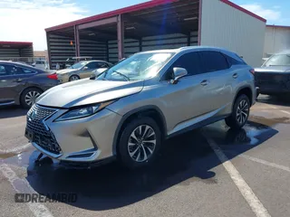 2020 Lexus RX with VIN 2T2HZMAA9LC163081, listed as a IAAI auction lot 41627232 with 38,153 mi miles. Bid and sale history available at carsss.com. Image 2.