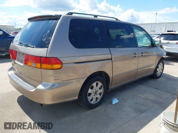 2003 Honda Odyssey EX-L z VIN 5FNRL18993B116892, wystawiony jako IAAI lot #42241908 z przebiegiem 276 223 mil mil oraz . Historia ofert i sprzedaży dostępna na DreamBid. Obrazek 4.