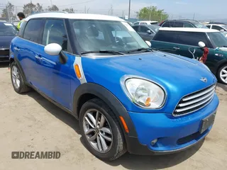 2013 MINI Countryman with VIN WMWZB3C57DWM31140, listed as a IAAI auction lot 42293220 with 168,890 mi miles and . Bid and sale history available at DreamBid. Image 1.